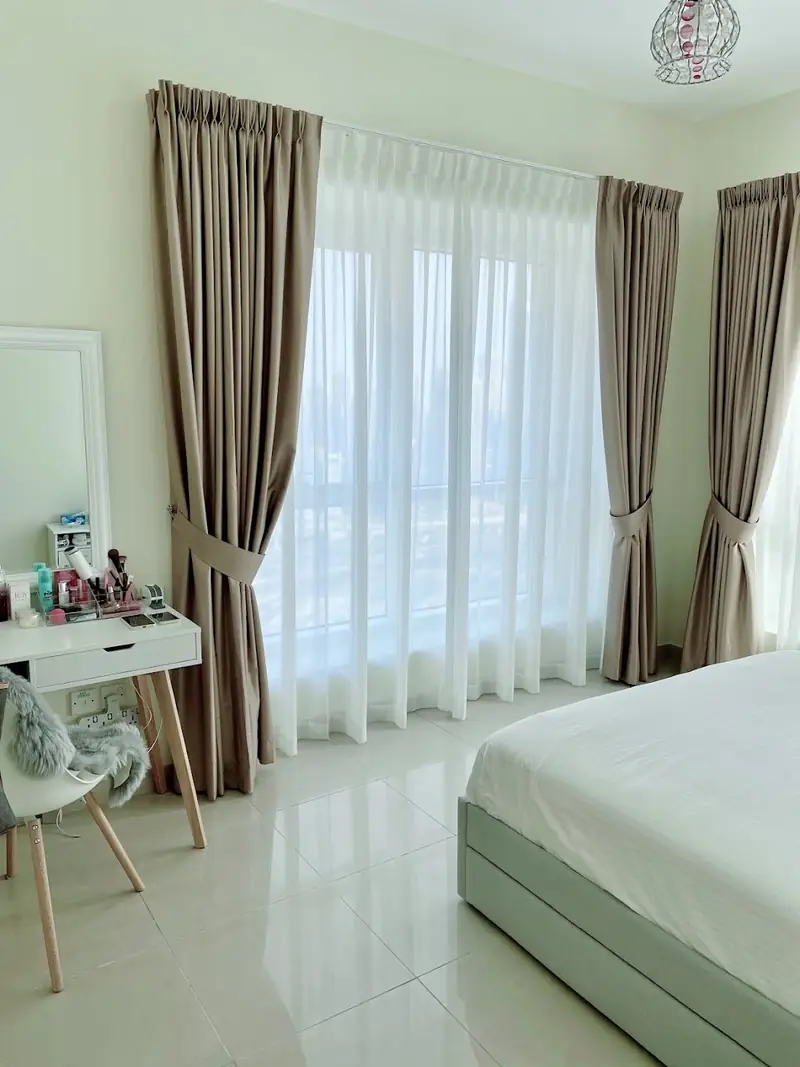 Blindtex curtains with sheers in a bedroom
